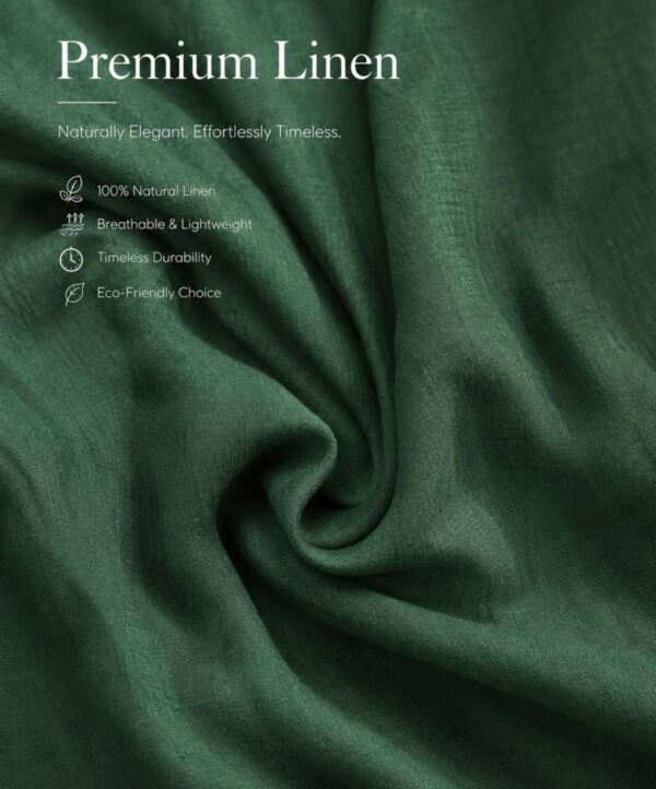 Nolié Vintage Linen Dress in deep green, showing the relaxed feminine fit