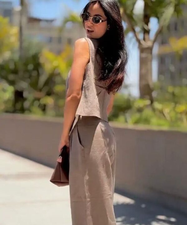 Soft Greige Suit in soft greige taupe, showing the high-waisted wide-leg trouser fit